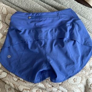 NEVER WORN wild indigo Lululemon speed up Mid rise 4” size 0- RARE color